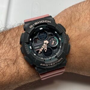 Casio Gshock, GMA-S140, gray bezel, dusty pink strap and accents working battery